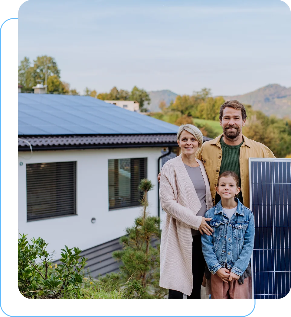 Group 297 Family standing by house with solar panel.